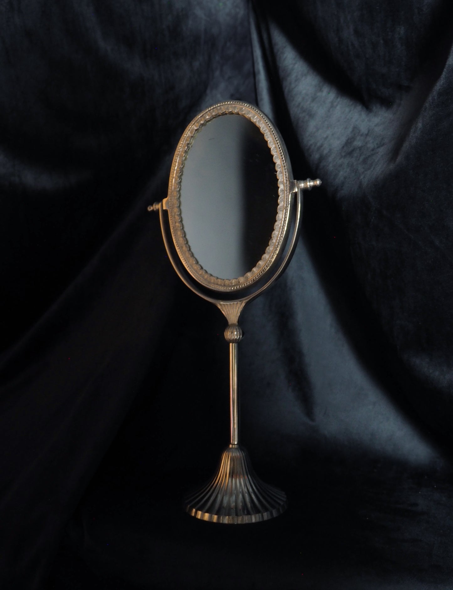 ANTIQUE OVAL MIRROR